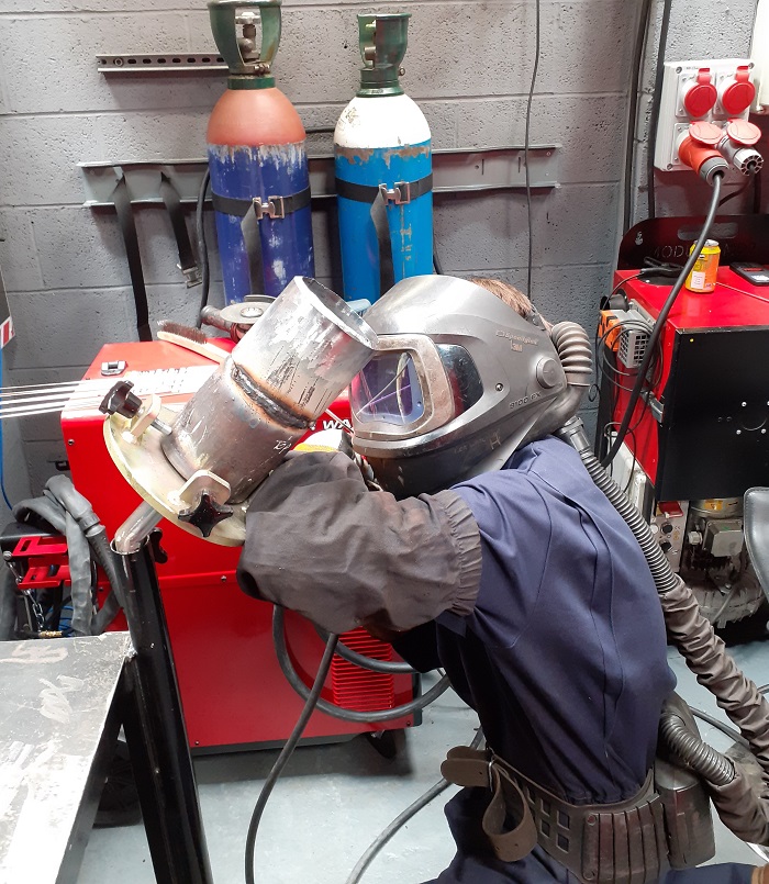 Apprentice welder Harry Pullan in action