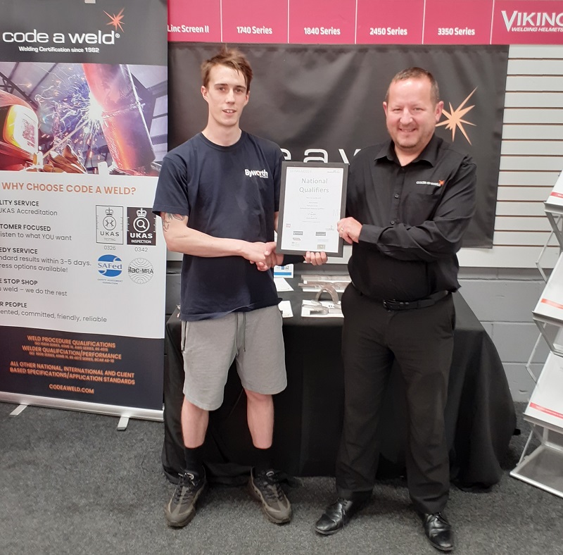 Apprentice welder Harry Pullan receiving his certificate, which earned him a place in the national finals, at the regional qualifiers of WorldSkills UK