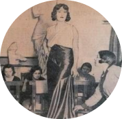 Black and white photograph of textile students in Keighley College learning to do dress fittings in 1933